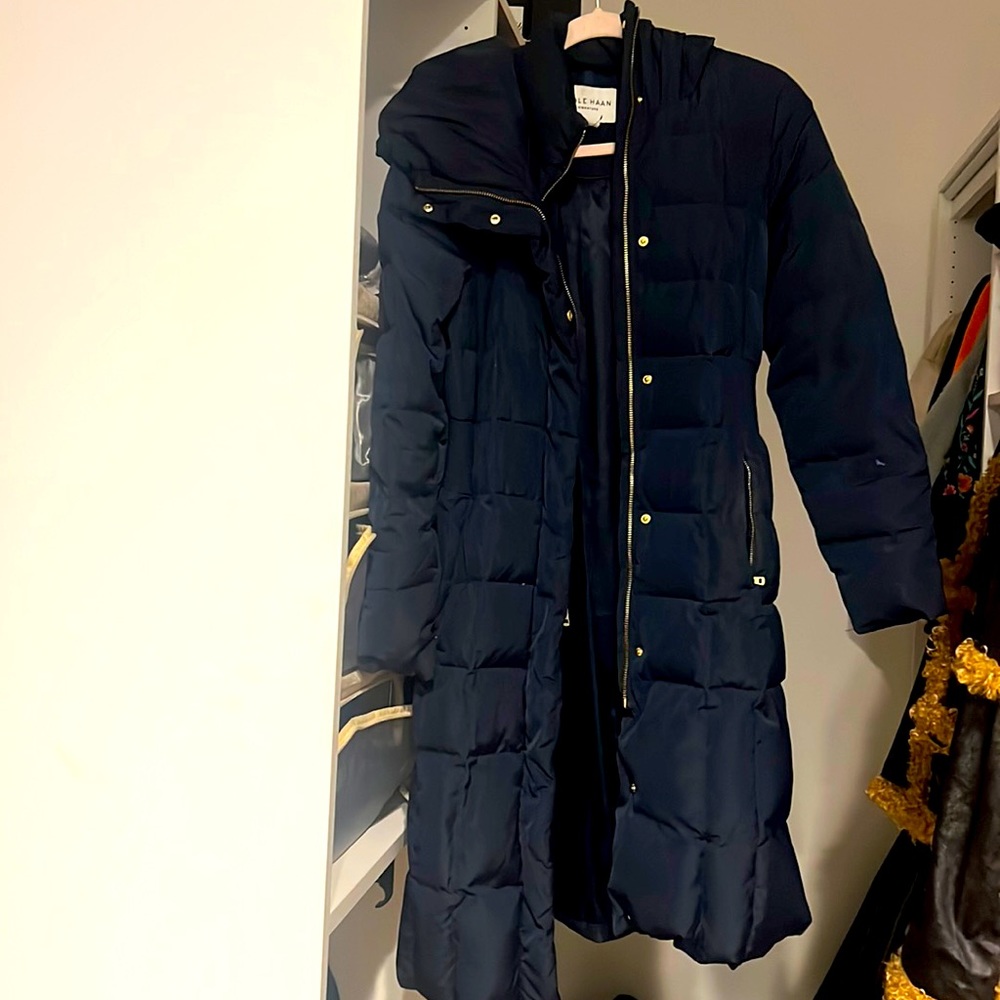 Cole Haan signature winter coat with double zipper.
